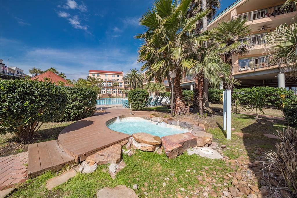 HOT tub near 2 of the pools.