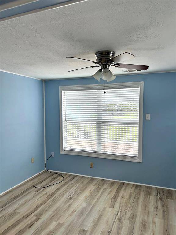 Primary bedroom overlooking back deck and views west - a great way to greet every morning