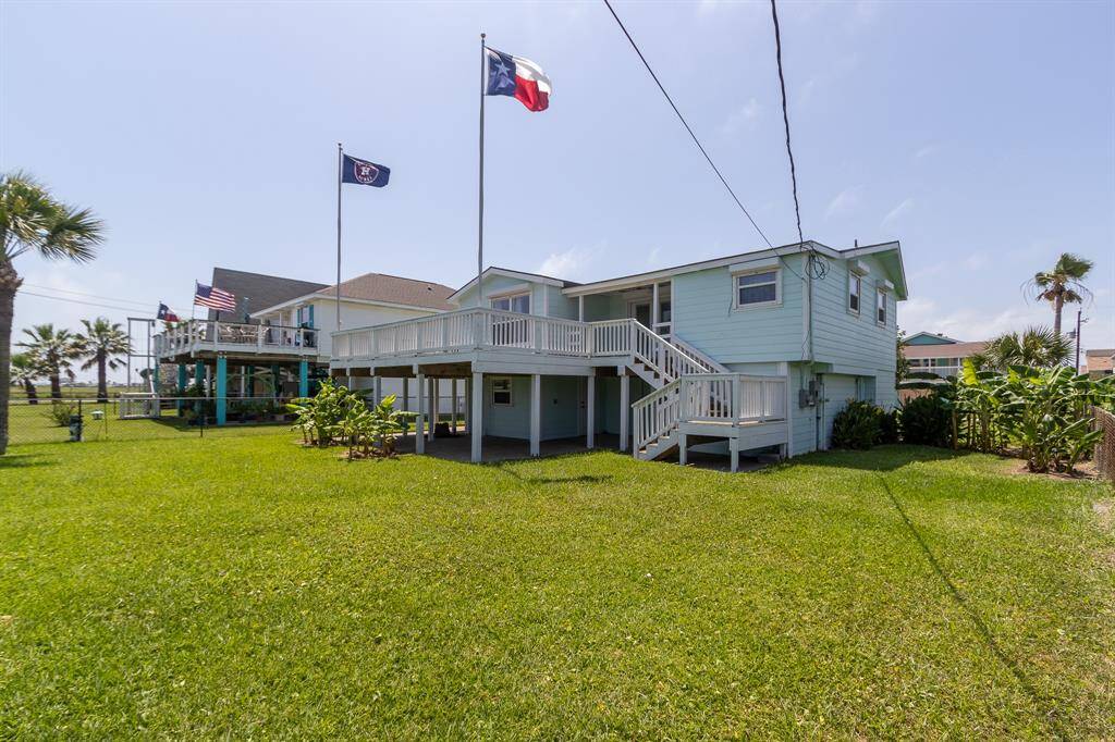 Welcome to your dream getaway in Jamaica Beach! This charming coastal home offers serene living, just steps from the ocean. Enjoy relaxing on the spacious deck, surrounded by lush greenery and ocean breezes. Perfect for a tranquil beachside lifestyle.