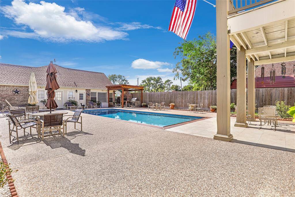 Pool area off pool house and home and covered patio area