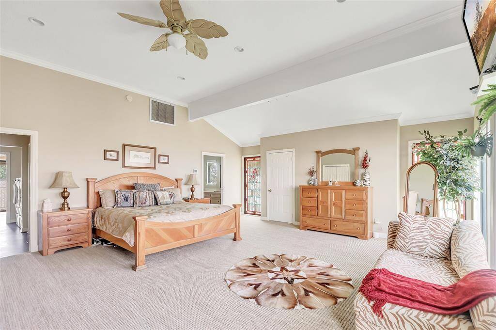 Primary bedroom with loads of storage, multiple closets and gorgeous bay views