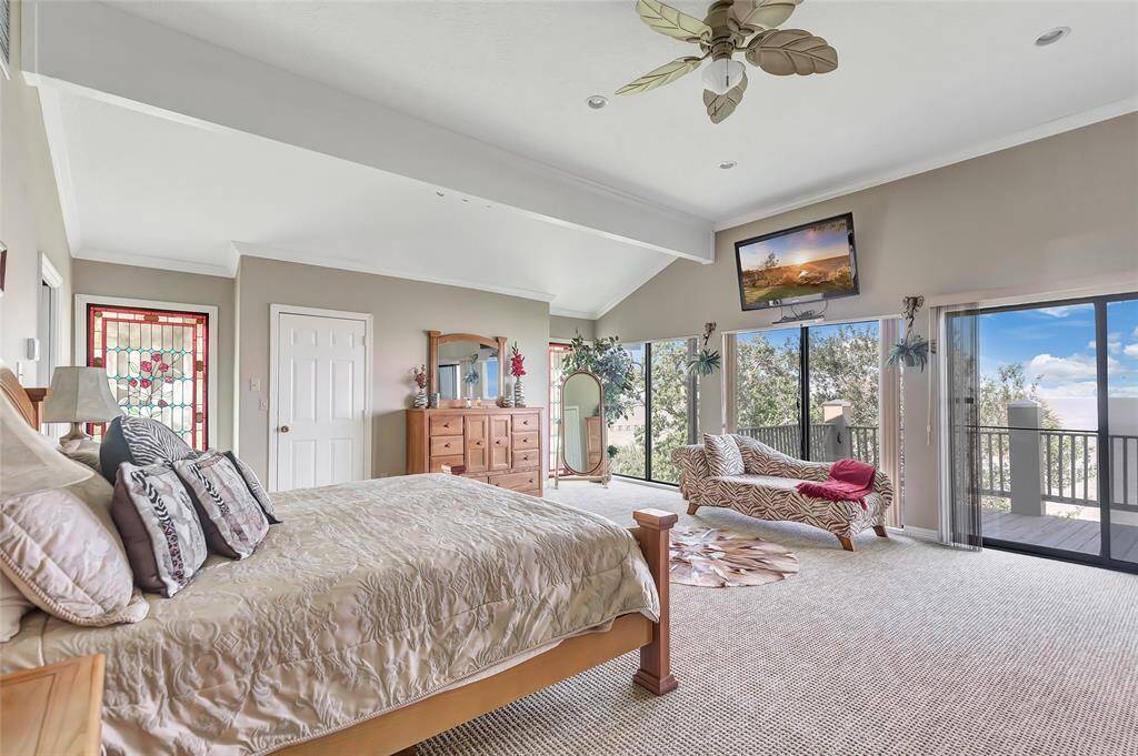 Primary bedroom has access to elevator leading to the living area below.