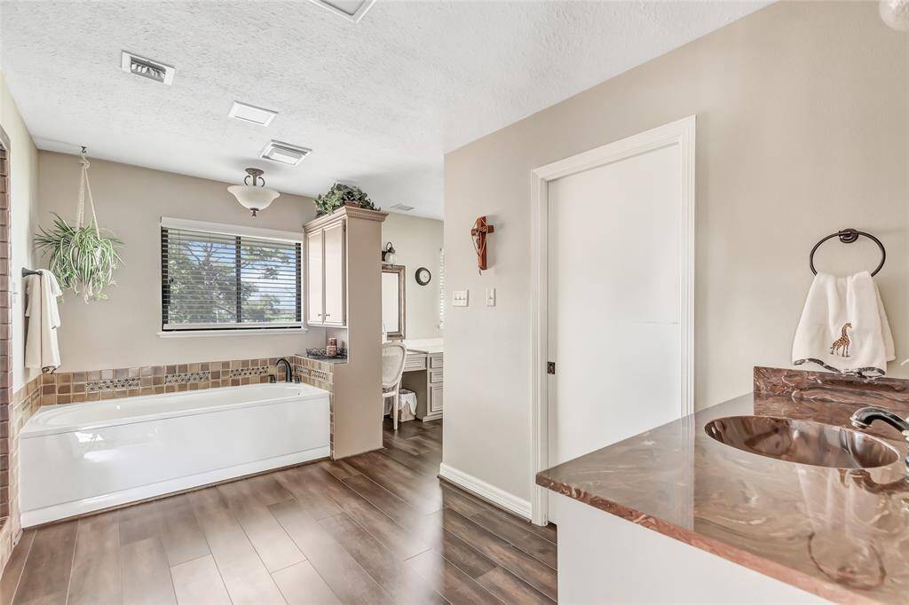Primary bath with seperate shower and soaker tub