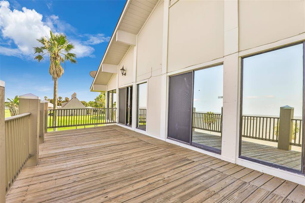 Balcony off primary bedroom with views of the bay