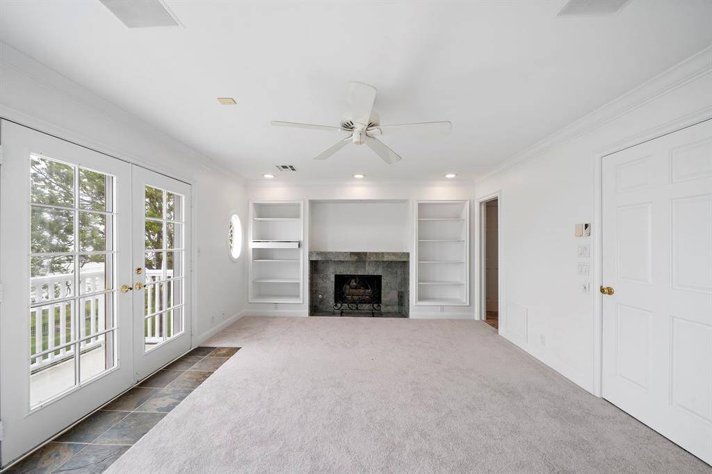 Another view of the primary master bedroom with balcony