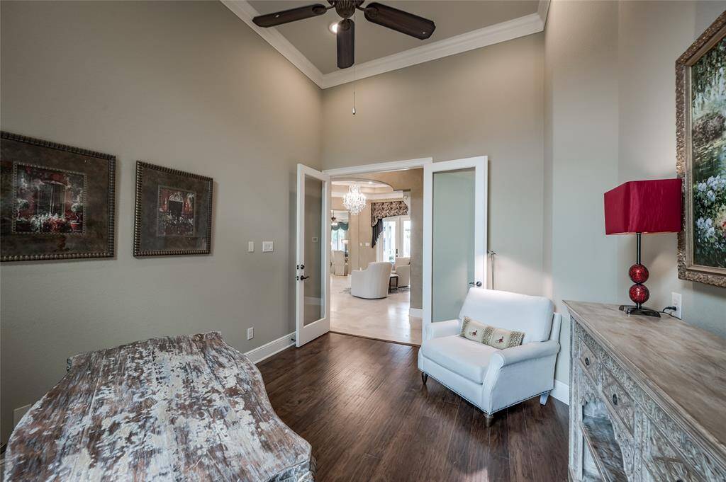 Tucked just off of the foyer, the study offers glass panel French doors for privacy while allowing a view into the main living area.