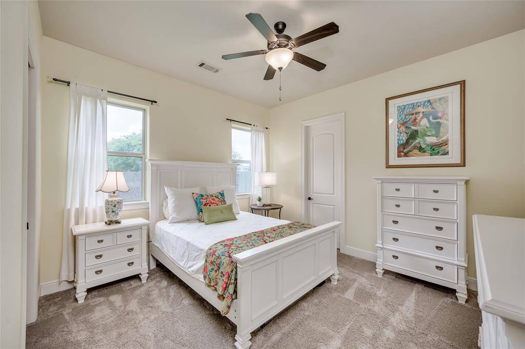 Bedroom 2 is generously sized and offers a large walk-in closet.