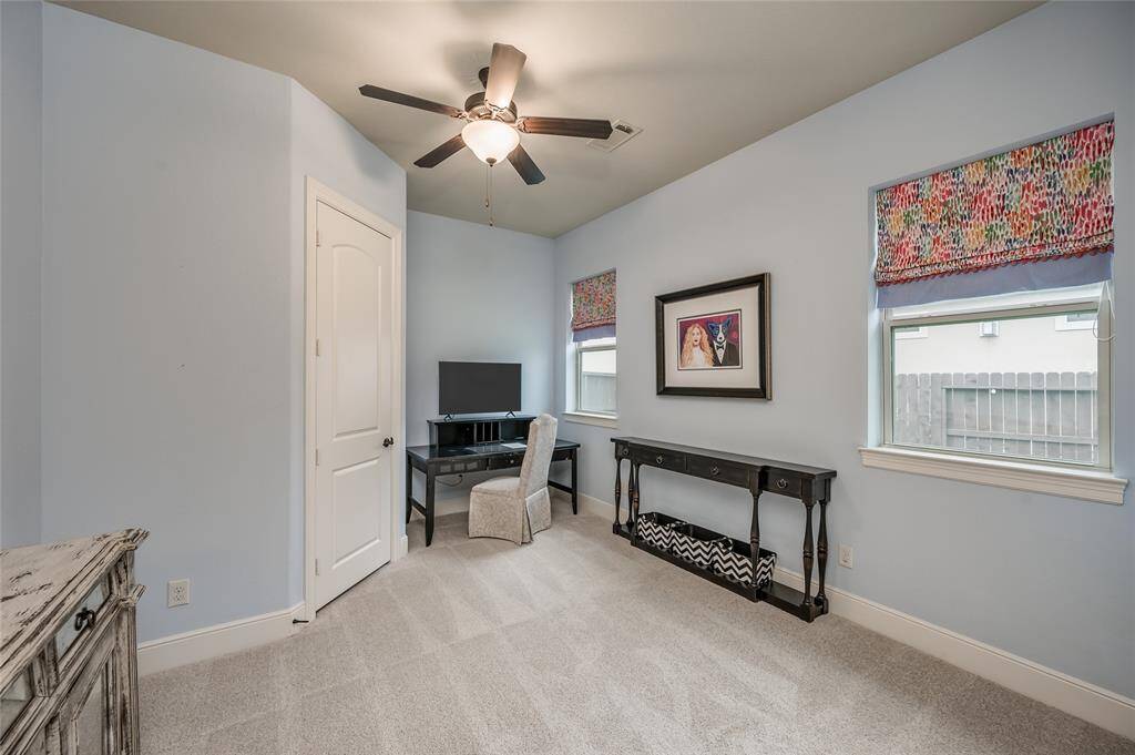 Bedroom 3 offers a desk nook area and a large walk-in closet.