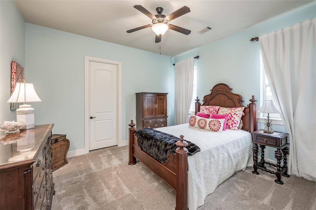 Bedroom 4 is located with a private entry just off the family room. This bedroom is generously sized and offers a large walk-in closet.