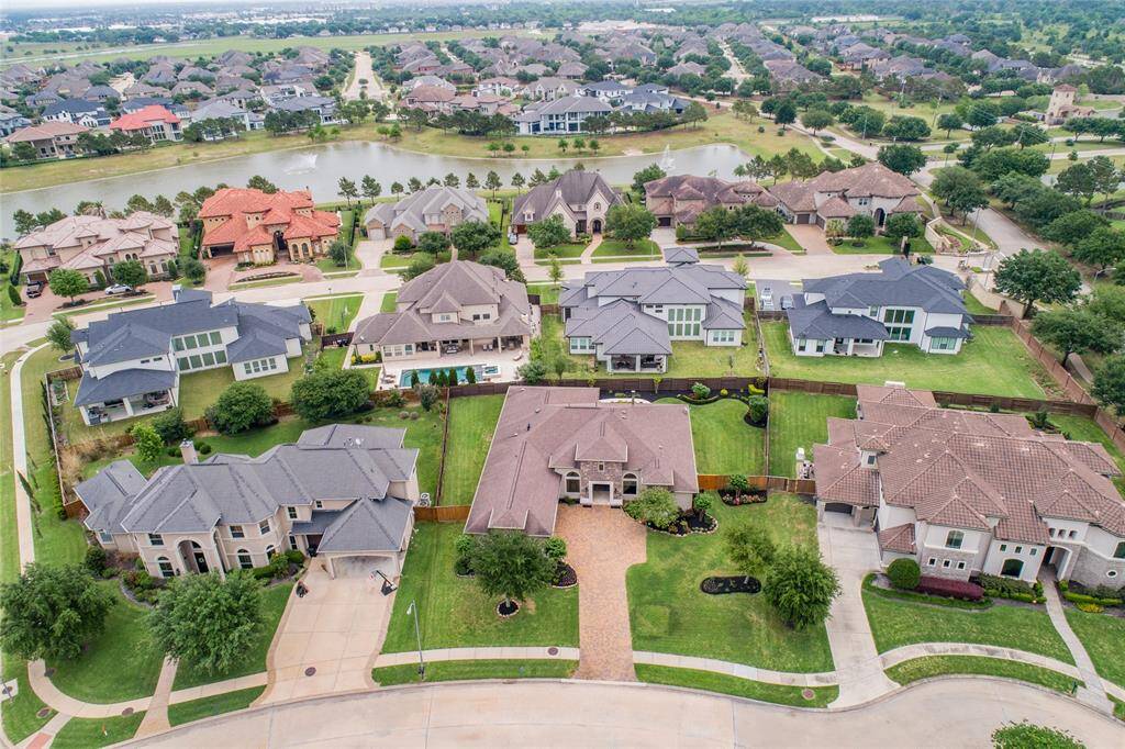 A Tuscan beauty nestled in Lakes of Bella Terra’s most prestigious area.