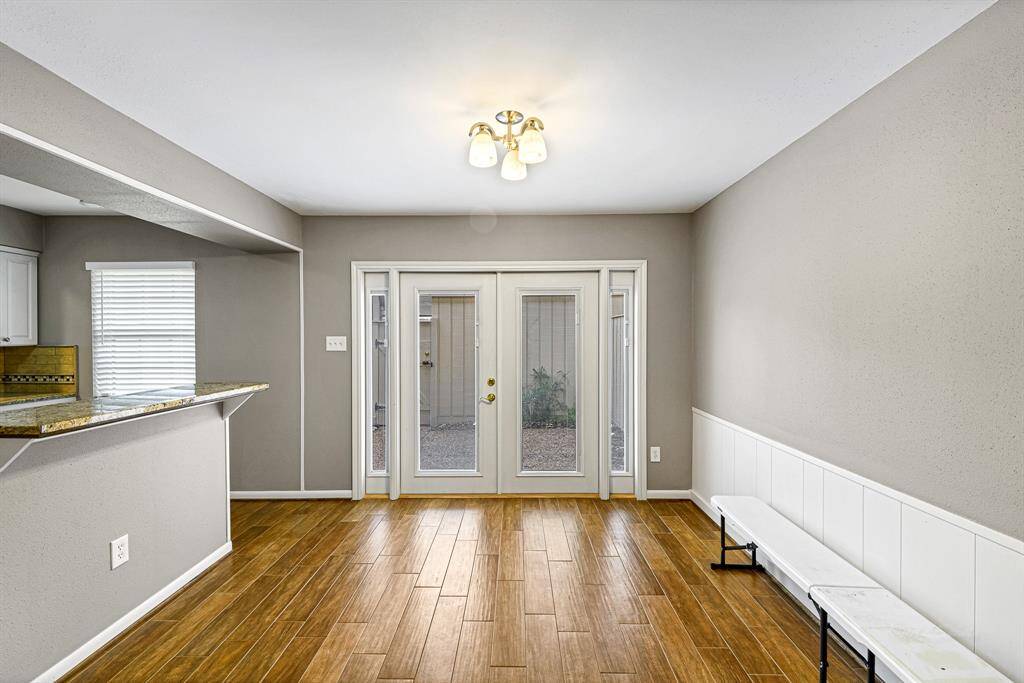 Convenient breakfast bar and French door access to back patio