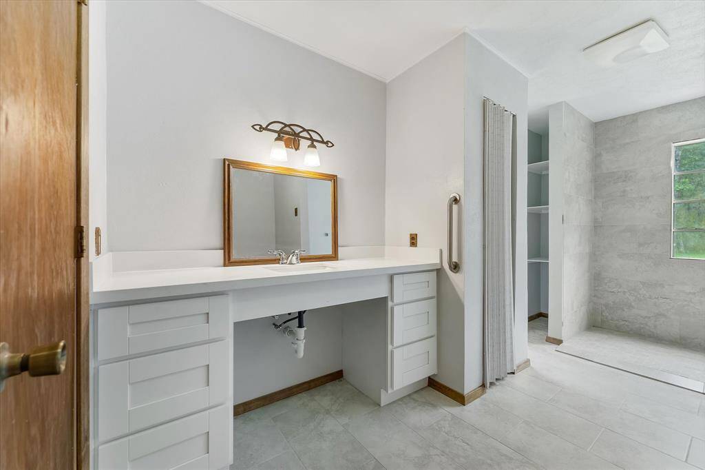 Ensuite master bath is updated! Photo virtually staged.