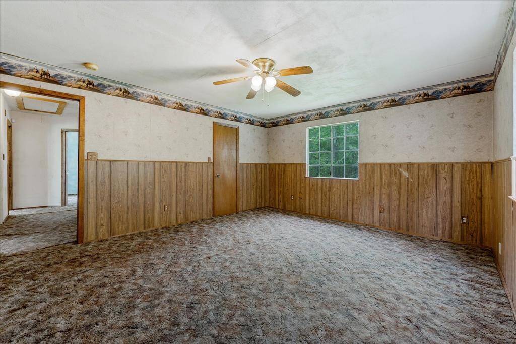 Bedroom 3, can be used for gameroom. Photo virtually staged.