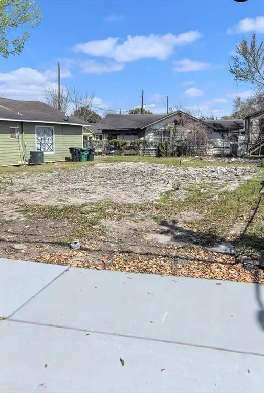This is a vacant lot with a concrete foundation, surrounded by residential homes, offering potential for new construction in an established neighborhood.