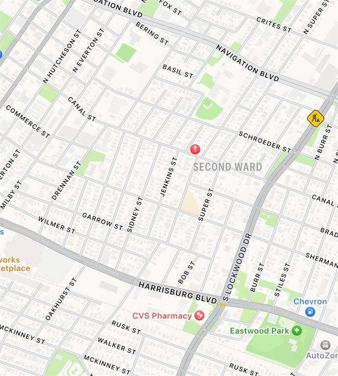 This is a map view of a residential area within the Second Ward, featuring close proximity to essential amenities like a pharmacy, parks, and main roads for easy commuting.