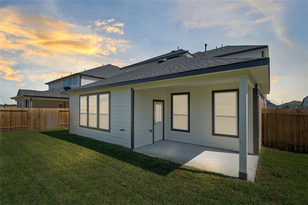 This backyard is enjoyable for everyone! From pets playing, kids jumping on the trampoline, or even having a garden, this amazing backyard provides space for endless activities for the whole family!