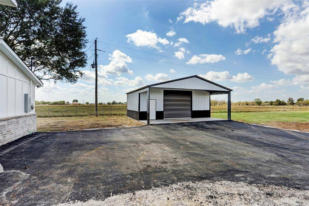 Large driveway and garage