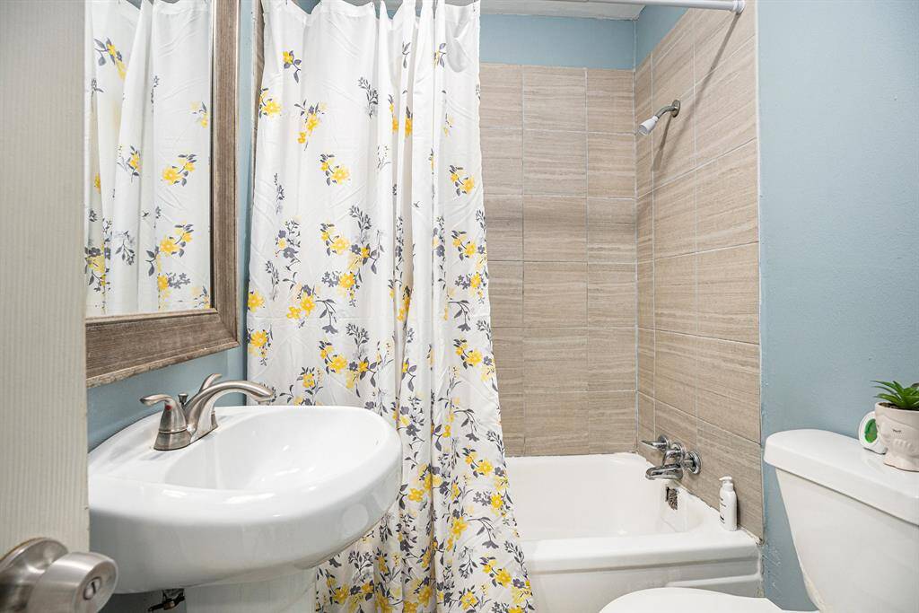 Charming Guest Bath with Cheerful Accents