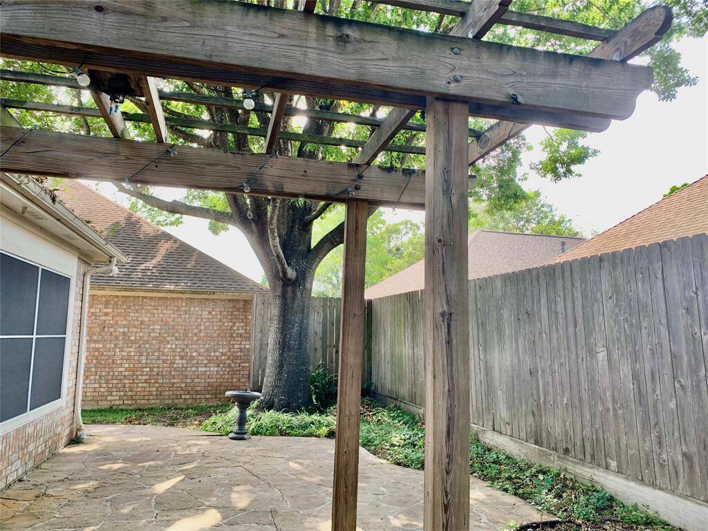 FLAGSTONE PATIO WITH PERGOLA