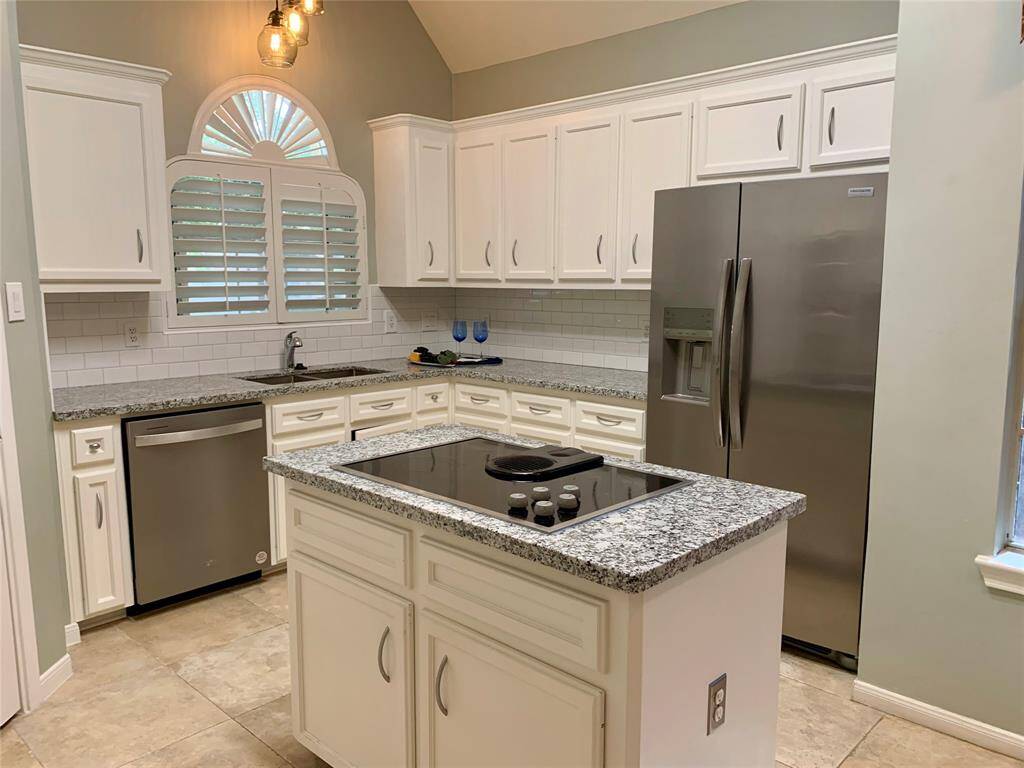 The refrigerator will remain with the house.