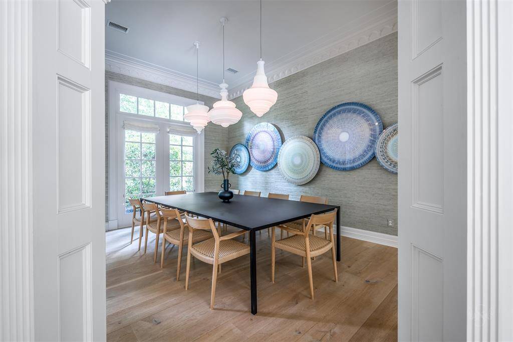 The formal dining room offers space to accommodate many guests.