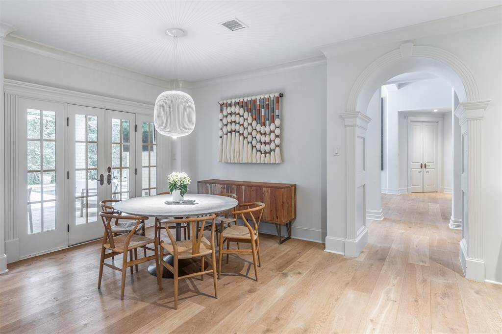 Entering into Family Room, you will find the breakfast area between the kitchen and den, to make entertaining effortless.