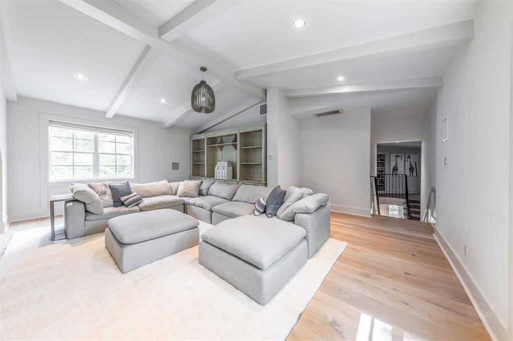 So much to love! An architecturally designed 11ft wood beamed makes this space lovely to enjoy.
