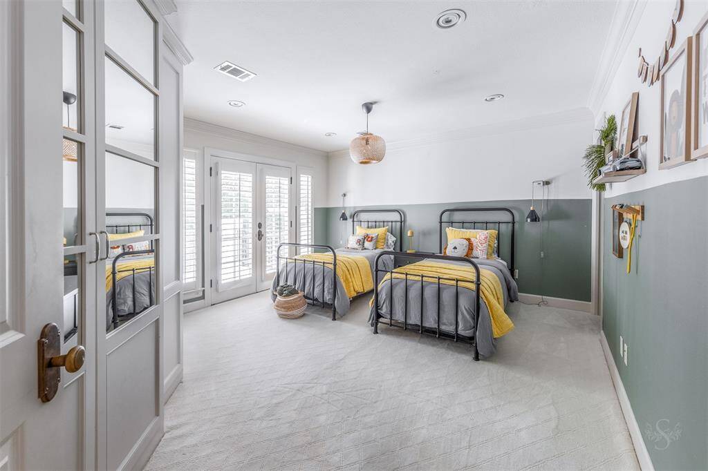 3rd Bedroom with french door access to balcony.