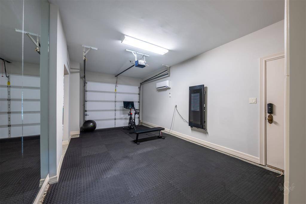 3rd space garage converted / used as gym with A/C.