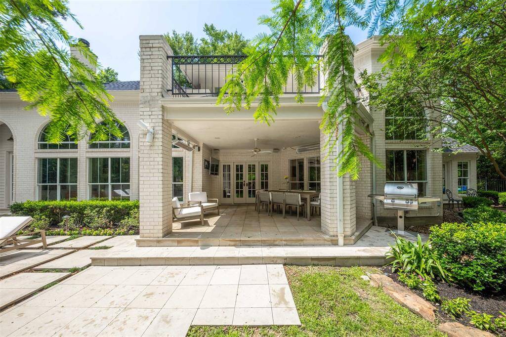 The backyard covered patio offers built-in heaters for the winter and a shady place for the summer.