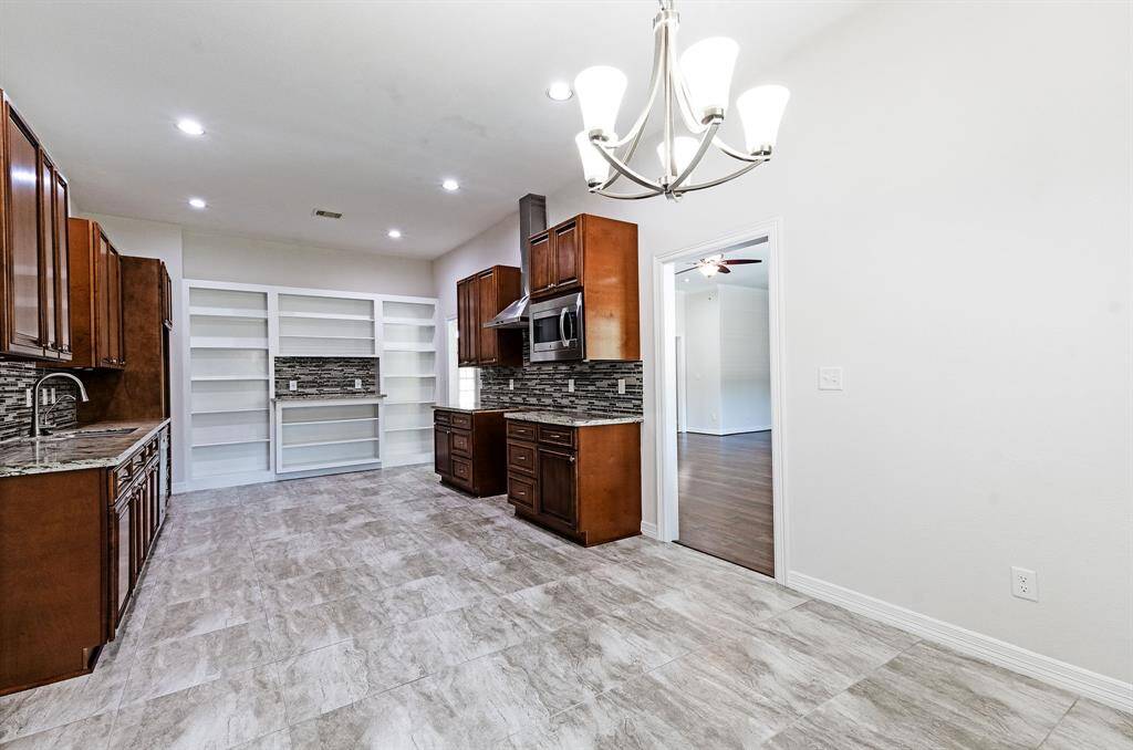 Huge Kitchen, built in area for appliances, cookbooks, decor.