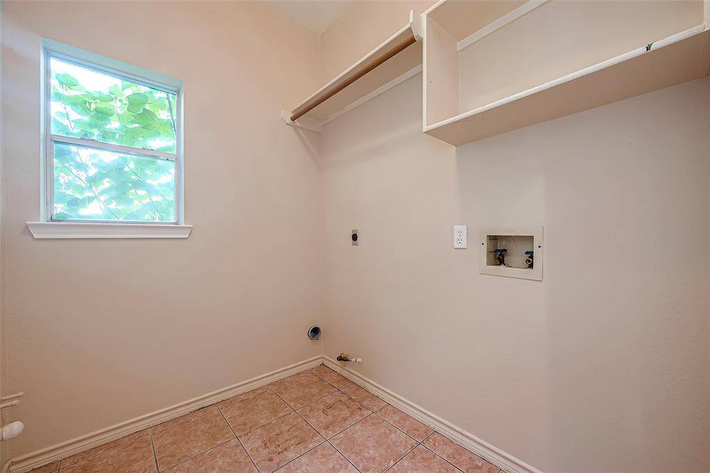 UTILITY ROOM in the House with Electric & Gas connections.