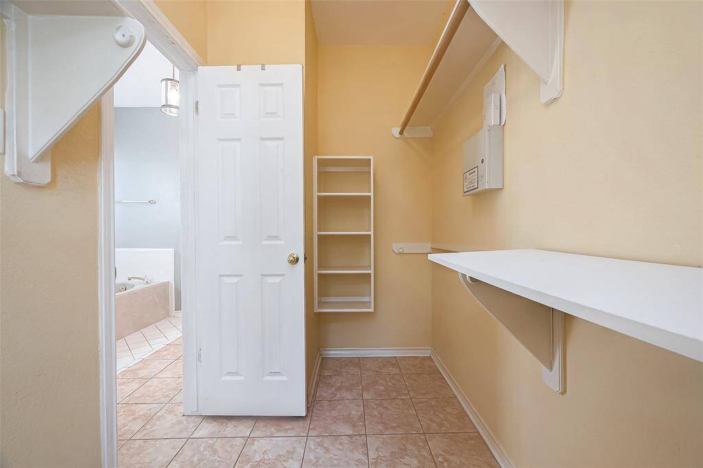 ANOTHER VIEW OF MASTER CLOSET.
