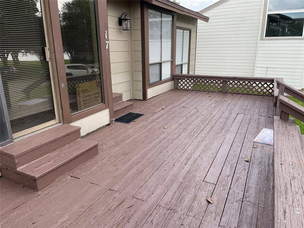 Expansive front deck perfect for relaxation and entertaining.