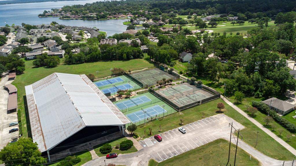 Enjoy world-class tennis facilities at April Sound, featuring both indoor and outdoor courts set in a picturesque lakeside community. Perfect for tennis enthusiasts seeking an active lifestyle.