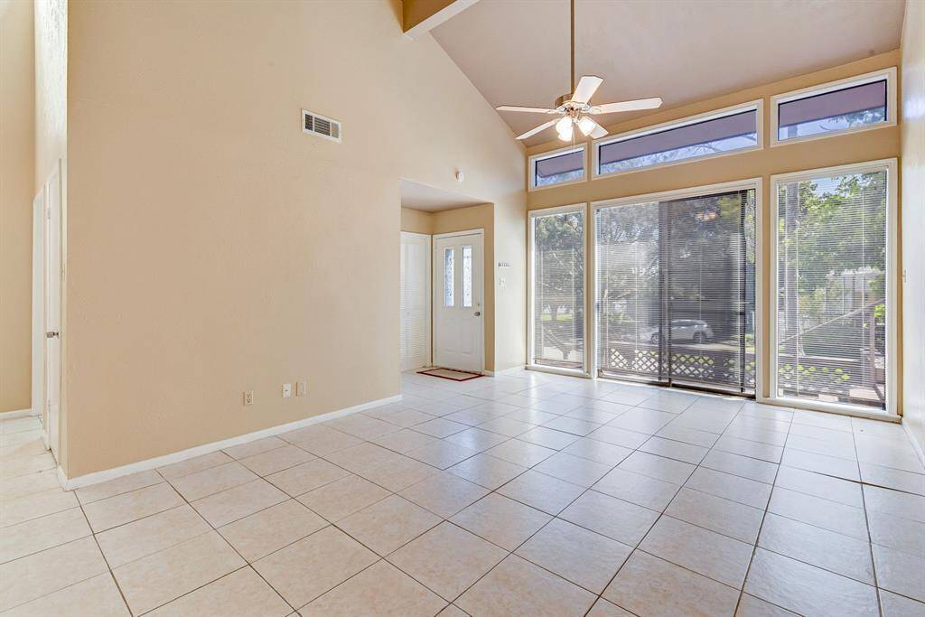 Recently refreshed with new paint, enhancing the home's inviting atmosphere.