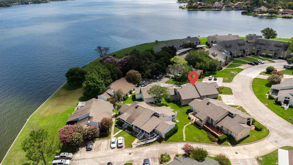 Experience tranquility in this charming home, nestled in a picturesque community with lush greenery and well-kept surroundings. Enjoy breathtaking water views in this serene neighborhood, perfect for peaceful living.
