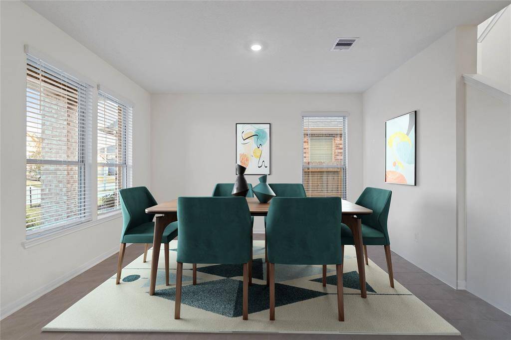Come and see this spacious backyard with its beautiful covered patio. There is plenty of room for the kids to play and adults to relax!