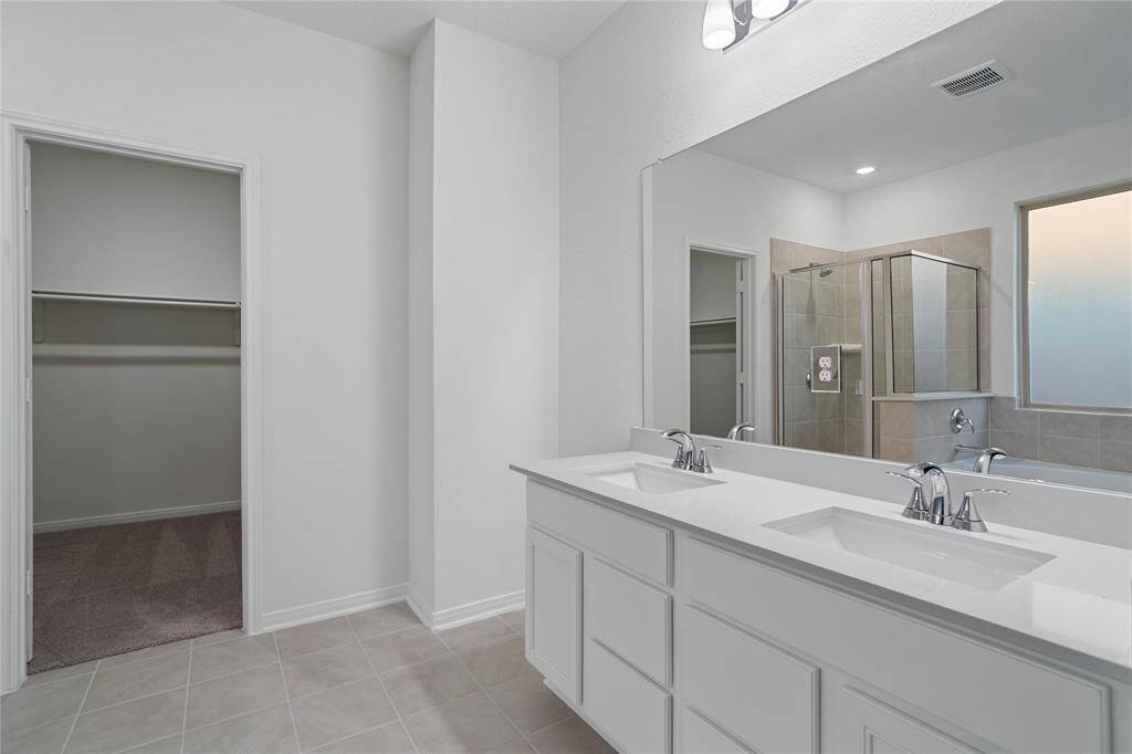 This floor plan features 4 bedrooms, 2 full baths, 1 half bath and over 2,600 square feet of living space.