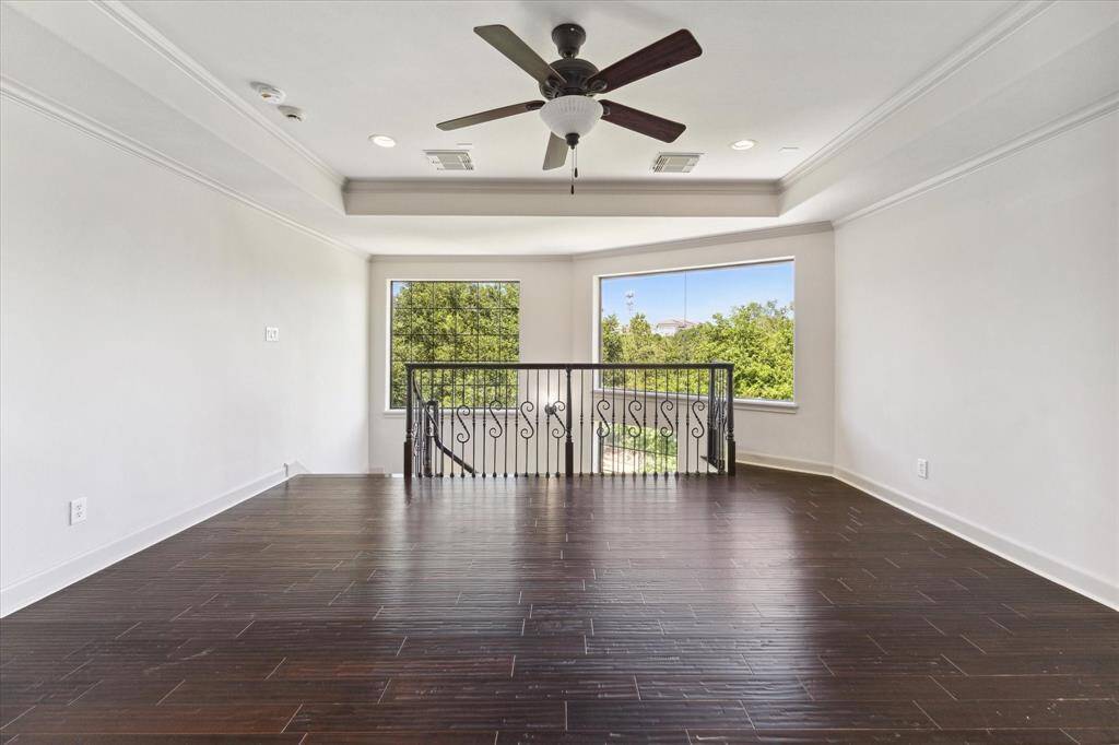 The game room on the third floor is a versatile area that can double as a home office or even a gym!