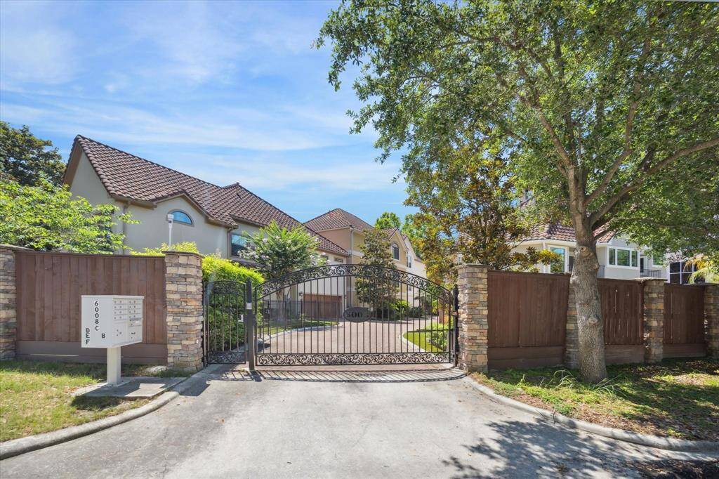 The home is situated in this gated enclave with a prime location near Memorial Park.