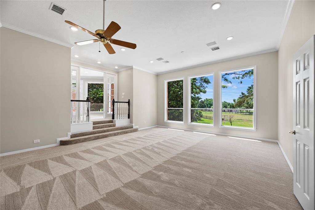 Upstairs game room is the perfect place to entertain.