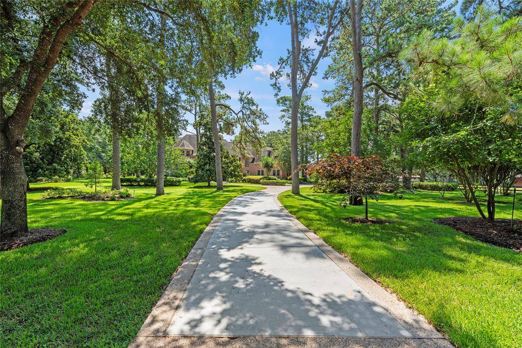 This long driveway leads to home and circle drive