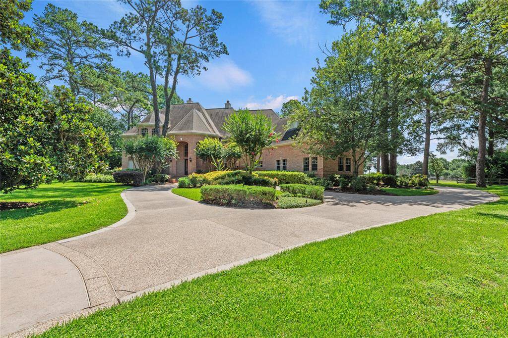 Country living at it's finest on almost 5 acres in Tomball, TX.