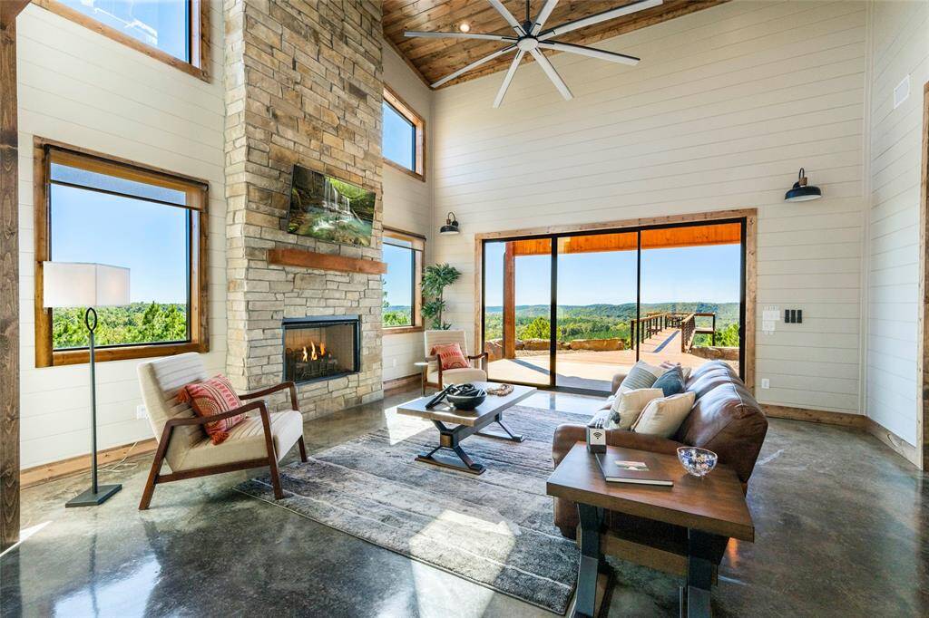 Expansive ceilings elevate both the physical and visual dimensions of the living room