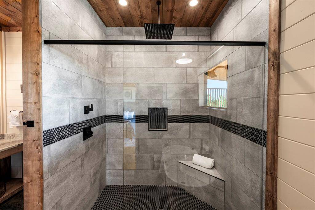 The sleek design and high-end fixtures create a spa-like atmosphere (West Master)