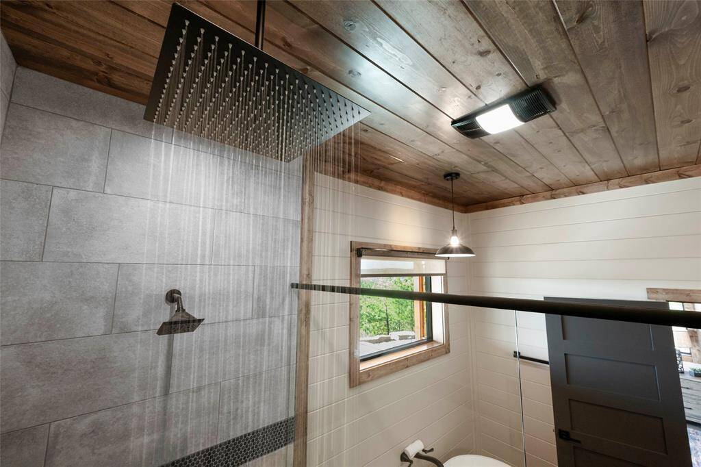 Luxuriate in the indulgence of walk-in showers with rain shower heads (West Master Bath)