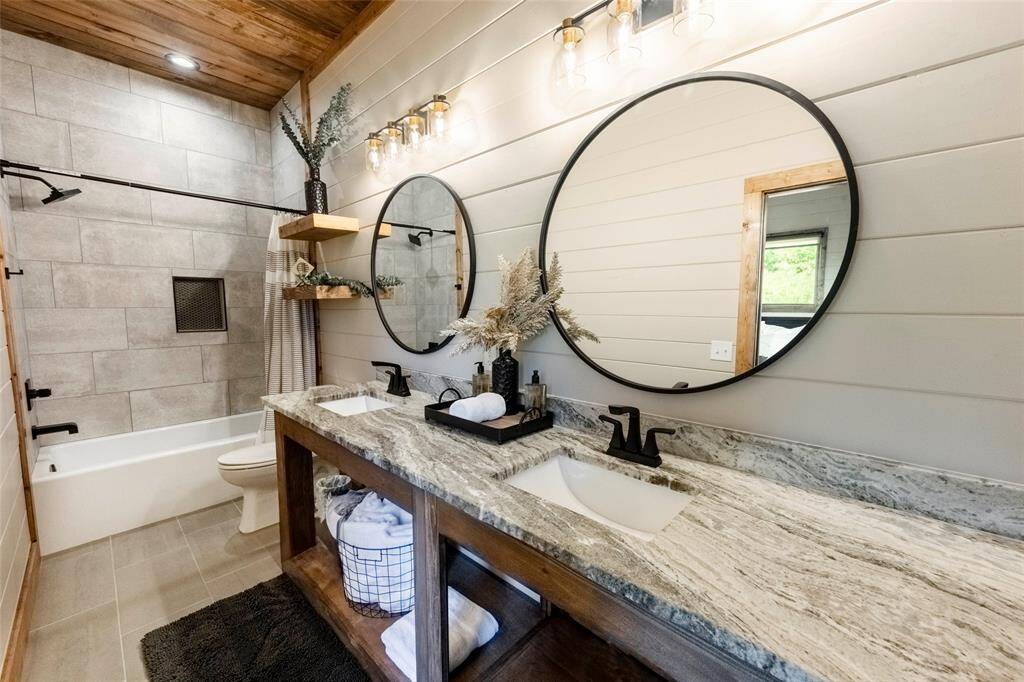 Step into a world of refined luxury with beautiful vanities in each bathroom (Triple Queen Bath)