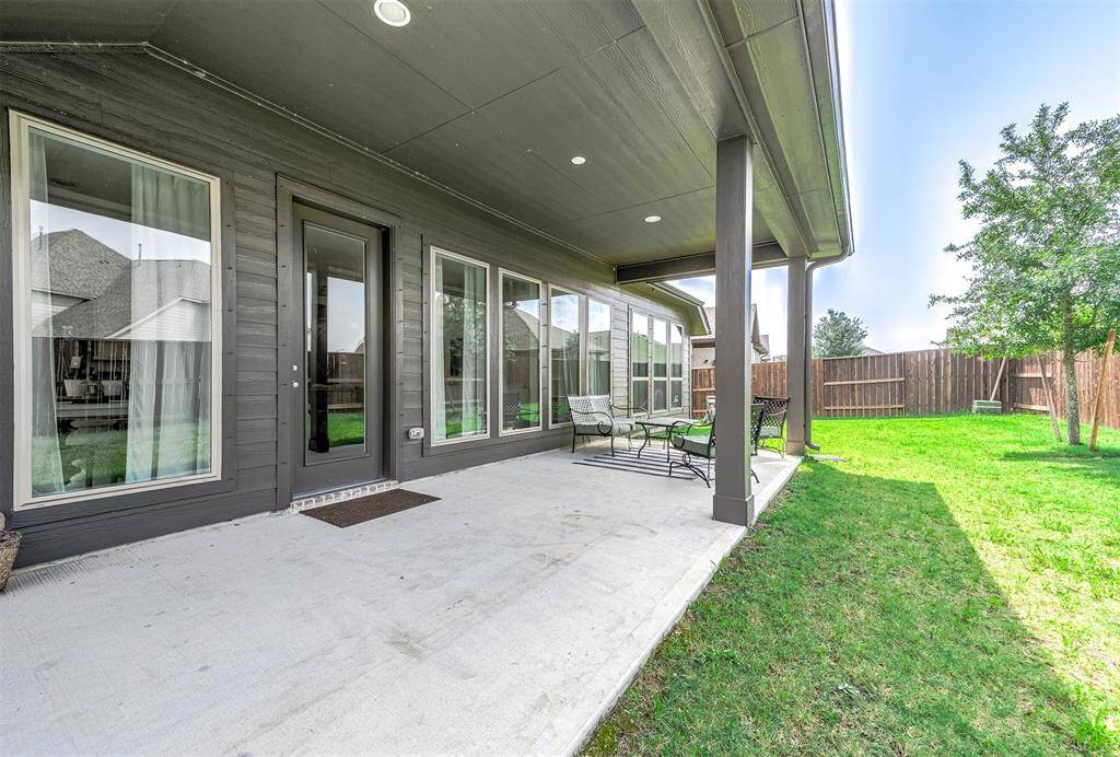 Enjoy family gatherings and morning coffee on the expansive 9x26 covered patio.