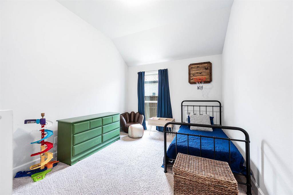 Bedrooms 2 and 3 are centrally located within the home, offering convenient access to Bathroom 2. This layout ensures ease and comfort, making it ideal for family living or accommodating guests.